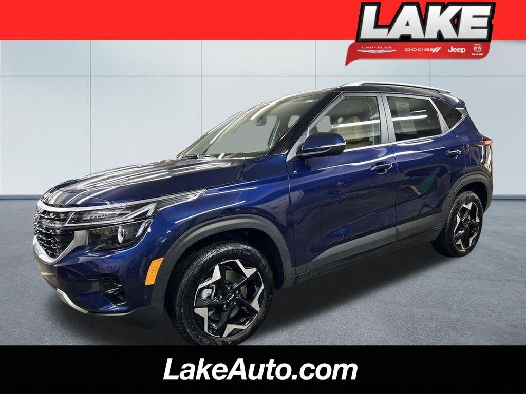 2024 Kia Seltos EX in Dark Ocean Blue — front three-quarter view